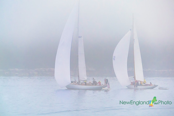 Sailboats in fog